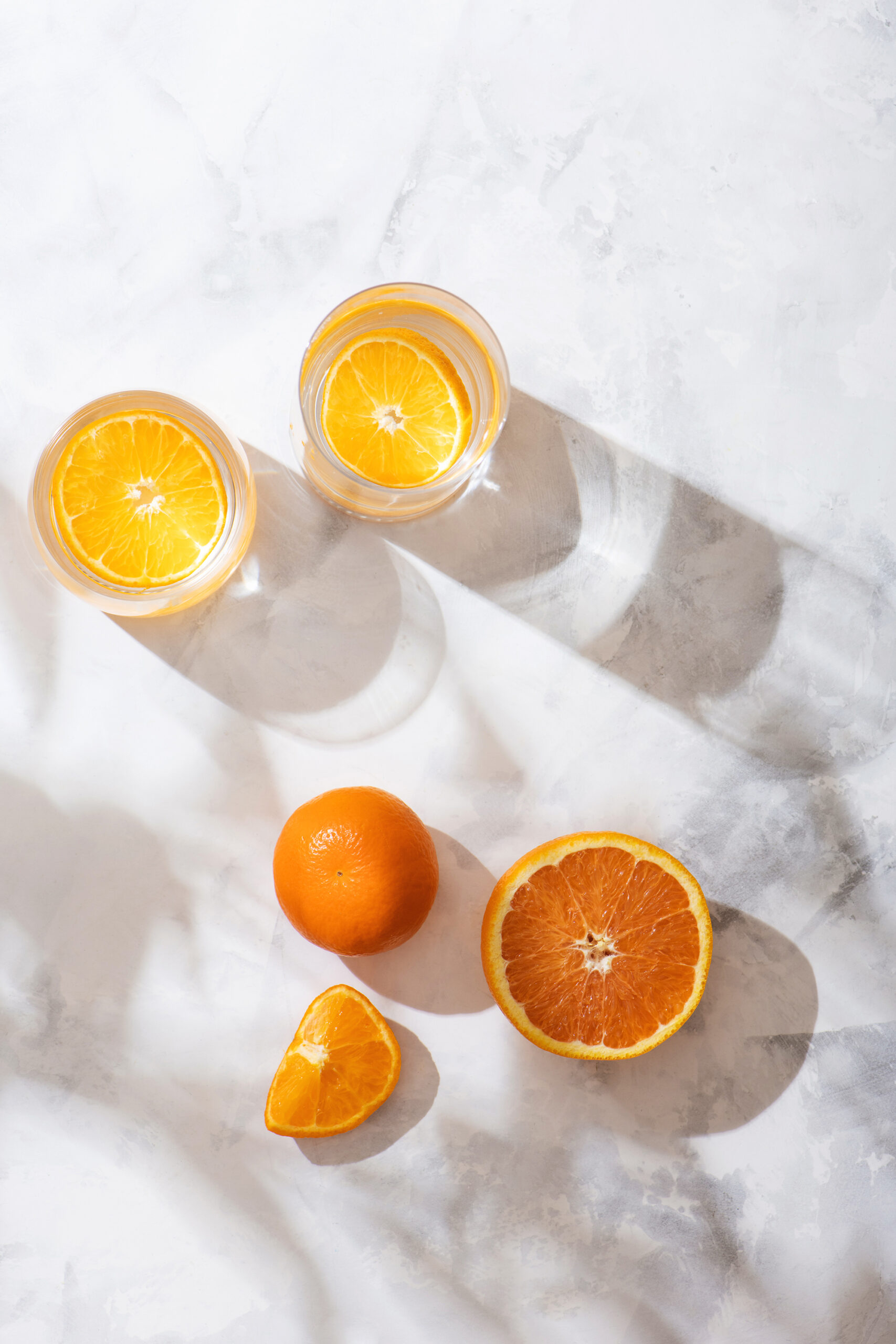 Orange and lemons and infused water is an idea of what to drink for optimal hydration and the topic of this blog