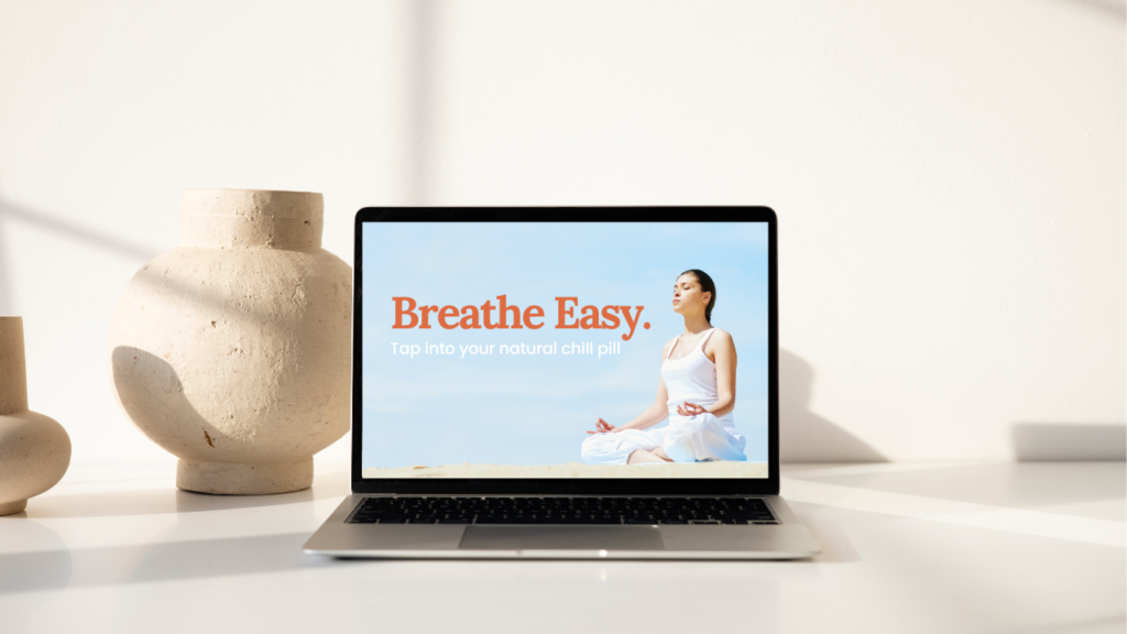 breathe easy online course on a laptop on a beige desk and room